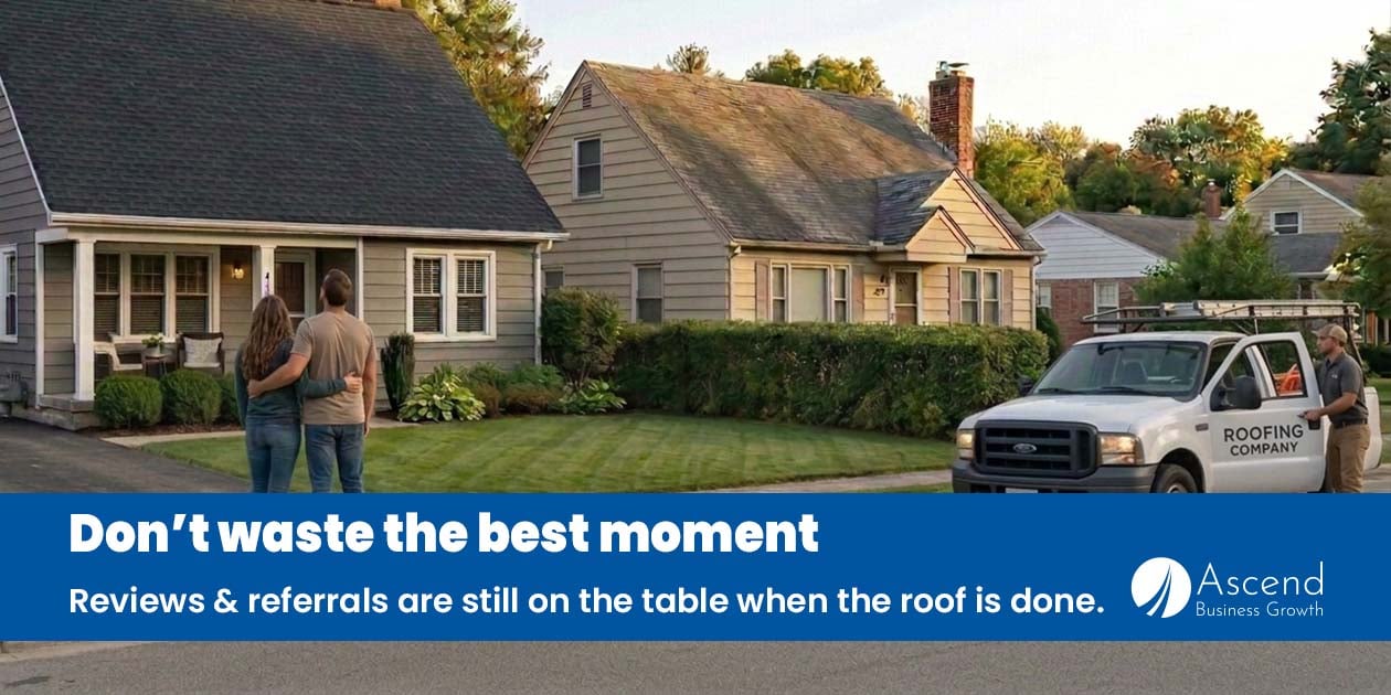 A homeowner standing in her driveway looking up at a newly finished roof