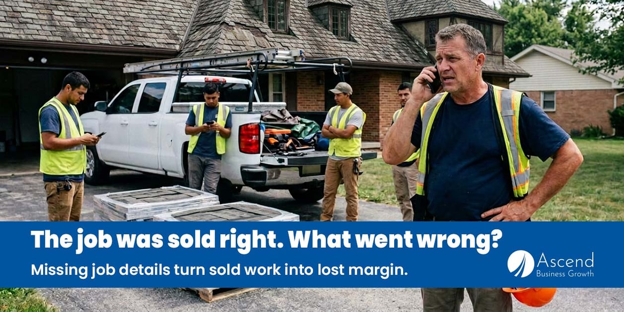 A roofing crew standing in a driveway beside their truck looking at a house, work not yet started